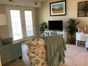 living room with tv in senior living residence